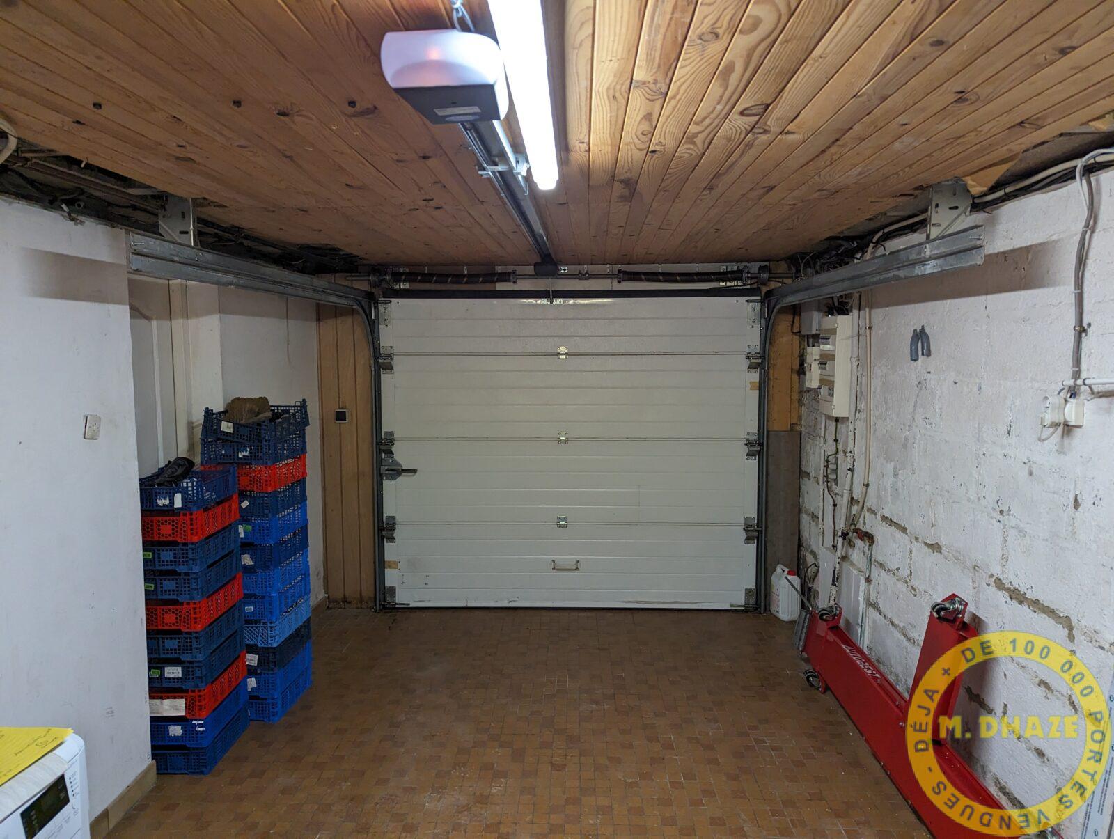 Remplacement ressort de tension et de la motorisation Dhaze