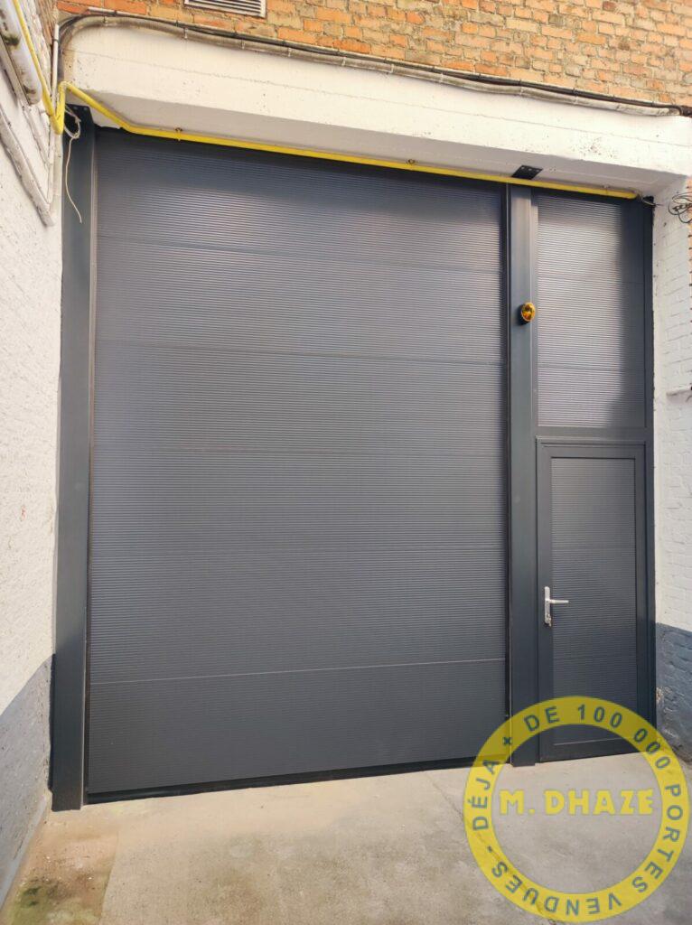 Porte industrielle sur mesure avec portillon et imposte à Lille (59)