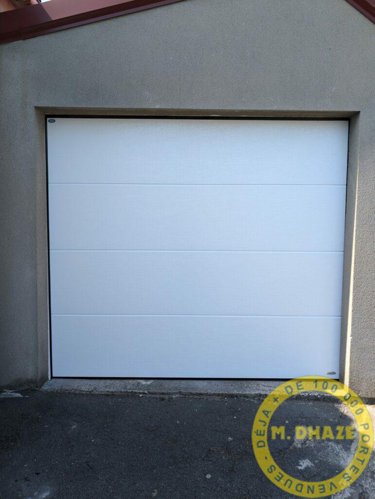 Porte sectionnelle Novoferm sans nervure Woodgrain à Roncq