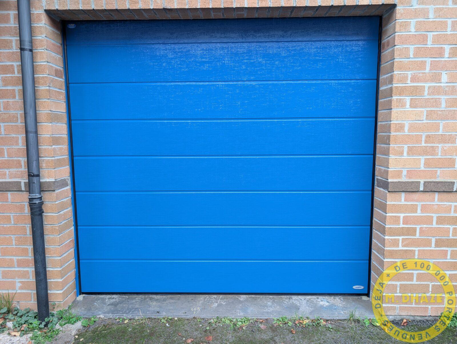 Installation d'une Porte de garage sectionnelle en remplacement d'un basculante à Lille dans les Hauts de France par les ETS Dhaze.jpg